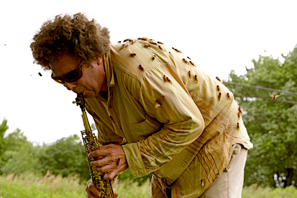 Just Do Art! 2 Photo courtesy of David Rothenberg David Rothenberg performing with cicadas. See “Insect Music.”