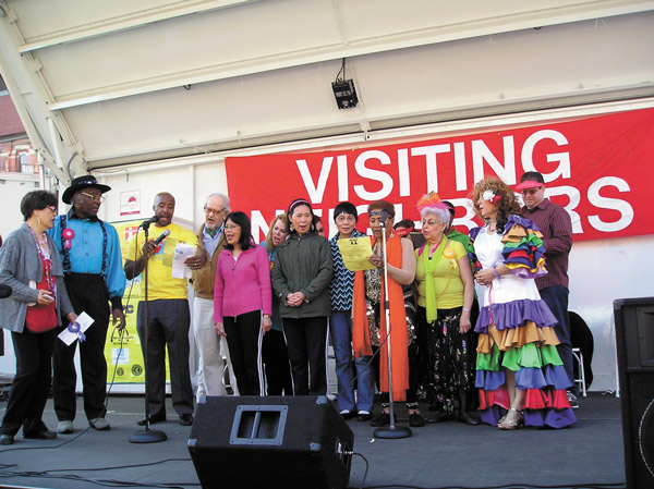 At Visiting Neighbors Street Fair, Talent is Ageless 2 The gang’s all here: performers gather on stage for the grand finale.