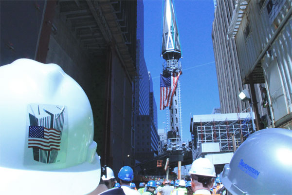 Last spire piece reaches top of 1 W.T.C.— assembly required 3 Spire1