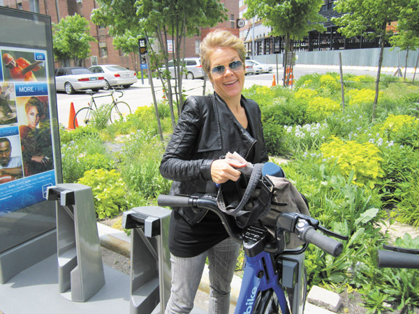 A reporter had plenty of room for her two bags in the front basket of her Citi Bike.