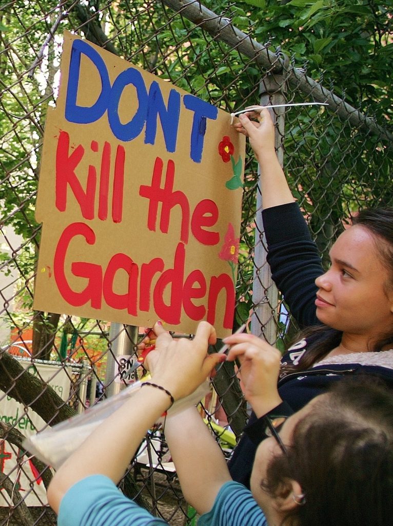 Gardeners dig in, as developer seeks to build on kids' haven 2 cmg, ev p. 1, tightest crop