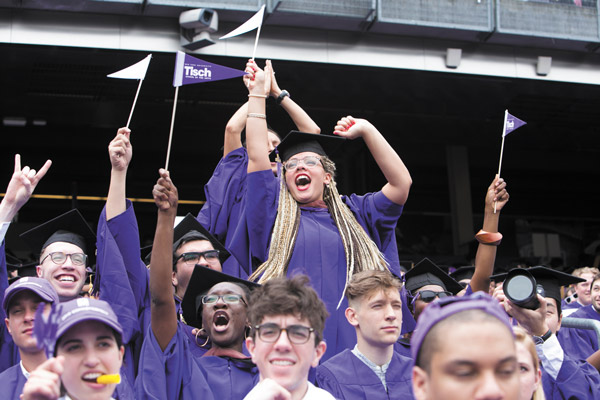 ©NYU Photo Bureau: Hollenshead Tisch School of the Arts graduates cheered as they received their diplomas. (One graduate from each N.Y.U. school ceremonially receives a diploma on behalf of all the graduates from that particular school.)