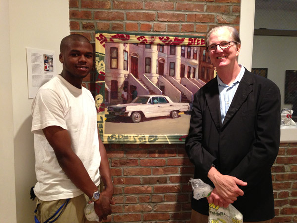 Just Do Art! 1 Photo by Sarah Hamblin Artist Robert Seyffert (right) and frame designer David “Mdot Beatz” Yearwood stand in front of Seyffert’s “White Chevrolet Sedan” (1995, Oil on Linen, 24 x 30 inches. Yearwood’s frame is from 2013). It’s part of “Urban Automobiles” — on view through June 16, at William Holman Gallery.