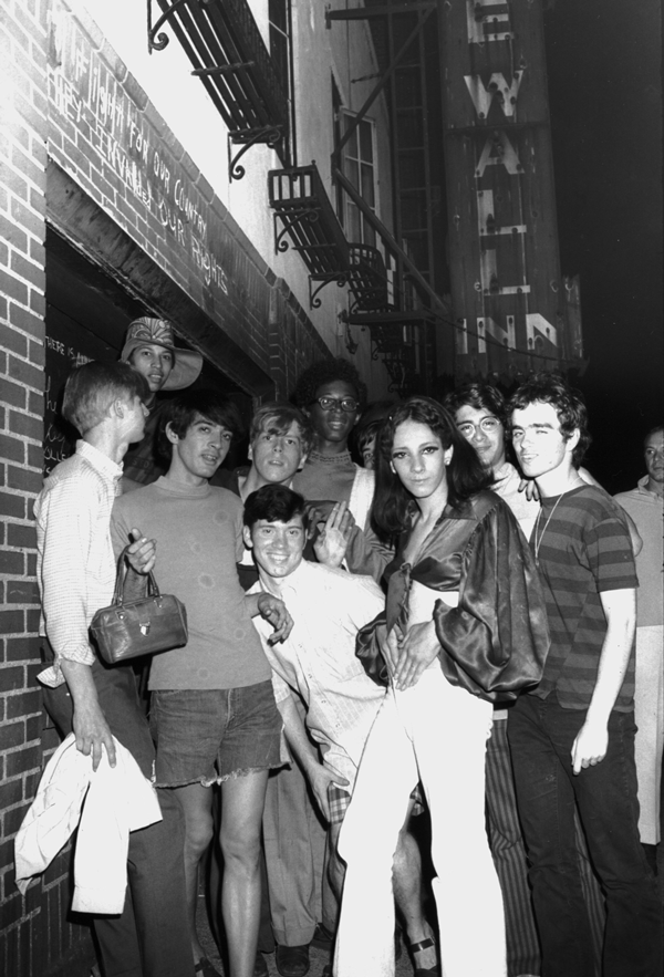 Put Me on Your Pride Plate 5 Courtesy of Steven Kasher Gallery, NY Fred W. McDarrah (1926-2007): “Celebration After Riots Outside Stonewall Inn, Nelly (Betsy Mae Koolo), Chris (Drag Queen Chris), Roger Davis, Michelle and Tommy Lanigan-Schmidt.” (RC Print, 1969. 8 1/2 x 5 1/2 inches).