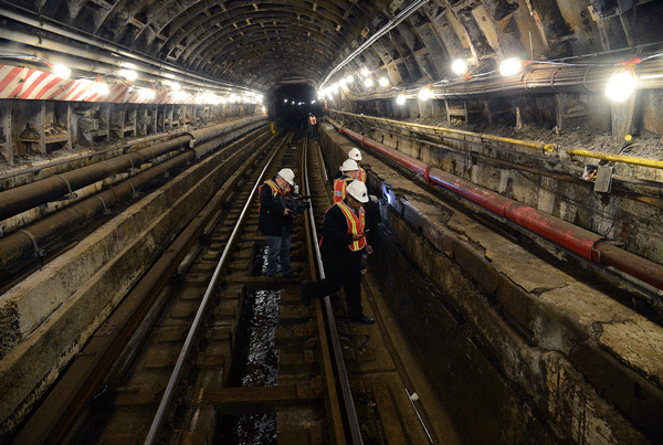  Image courtesy of M.T.A. New York / Marc A. Hermann M.T.A. staff surveyed the damage to the Montague Tubes on April 15, 2013. 