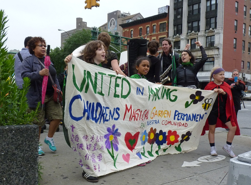 Photos by Michael Natale / Gammablog On Thursday, children and parents marched from the Children’s Magical Garden to the Community Board 3 Parks Committee meeting. 