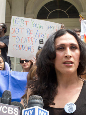 Photo by Gerard Flynn At a rally at City Hall earlier this month, a transgender person spoke out against using condoms as evidence.