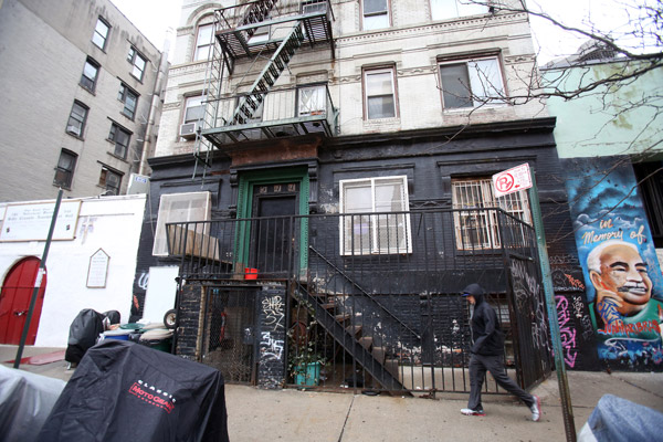 The troubled former squat at 544 E. 13th St., above, will be fixed up by a private developer under the city’s plan.  File photo by Jefferson Siegel