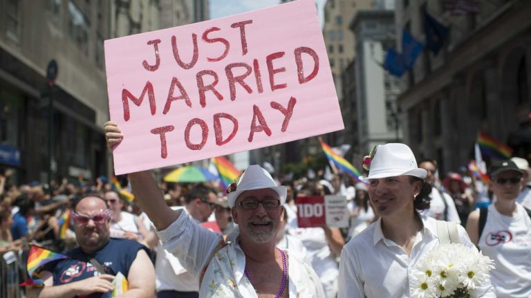 Participants march in the 2013 NYC Pride parade, which was especially well-attended and exuberant following the U.S. Supreme Court decisions restoring same-sex marriages to California and granting gay couples the federal benefits of marriage.
