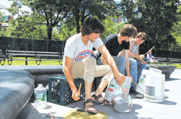 Photos by Tequila Minsky Drummers in Washington Square Park banged out funky beats on spackling buckets.