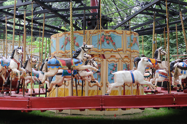 The oldest carousel at Fete Paradiso on Governors Island this summer has 28 jumping horses. It dates from 1850. (Photo: Terese Loeb Kreuzer)