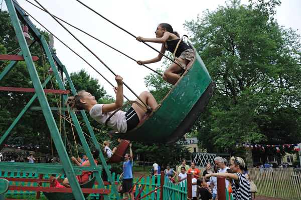Boat swings at Fete Paradiso on Governors Island. (Photo: Terese Loeb Kreuzer)
