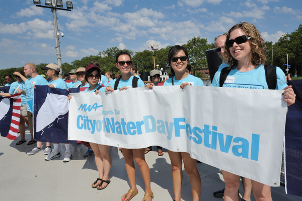 Volunteers stood on Governors Island's Yankee Pier to greet people arriving for the Metropolitan Waterfront Alliance's City of Water Day on July 16.