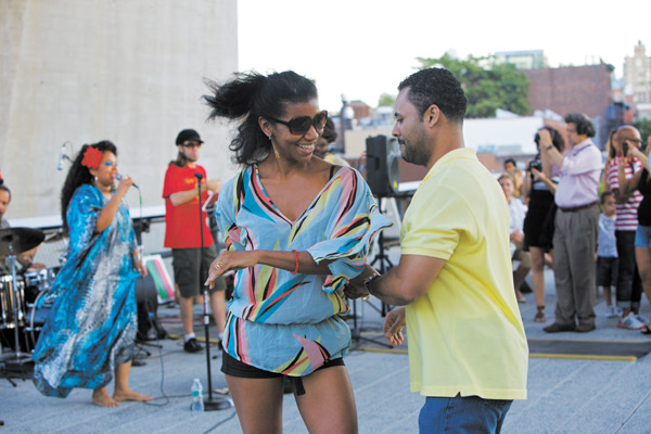 Photo by Liz Ligon, courtesy of Friends of the High Line ¡Arriba! Community Dance Parties bring a little swing to those hot summer nights.