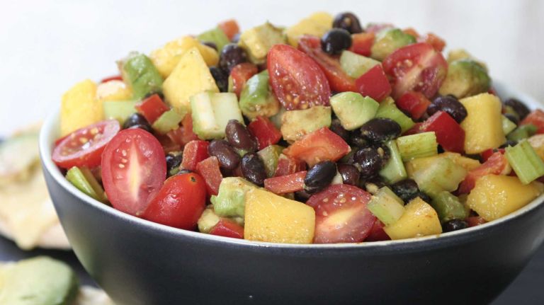 <b>WHAT YOU'LL NEED</b>:<br> 1 (15-ounce) can lower-sodium black beans, drained and rinsed<br> 4 ribs celery, chopped into 1/4-inch pieces<br> 1 red bell pepper, cut into 1/4-inch dice<br> 1 mango, cut into 1/4-inch dice<br> 1 cup grape tomatoes, halved<br> 2 teaspoons lime juice<br> 1/4 teaspoon ground cumin<br> 1/4 teaspoon smoked paprika<br> 1/8 teaspoon roasted ground coriander<br> 1 tablespoon extra-virgin olive oil<br><br> <b>HOW TO</b>:<br> 1. Combine the black beans, celery, bell pepper, mango and tomatoes in a bowl.<br><br> 2. In a small bowl, combine the lime juice, cumin, paprika and coriander; whisk in the olive oil. Toss with the bean mixture.