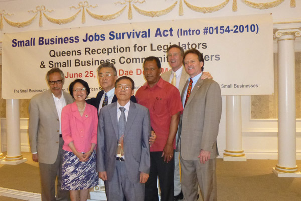 Supporting the passage of the Small Business Survival Act, from left, Alfred Placeres, president of the New York State Federation of Hispanic Chambers of Commerce; City Councilmember Margaret Chin, the bill’s prime sponsor; Sung Soo Kim, president of the Korean American Small Business Service Centers; Gaejan Kim, chairman of the Korean Small Business Organization; Luis Tejada, tenants rights activist and candidate for City Council in the Seventh District (West Harlem, Morningside Heights, Washington Heights, Inwood); Steven Null, founder, Coalition to Save New York City Small Businesses; and Steve Barrison, spokesperson for New York City Small Business Congress.