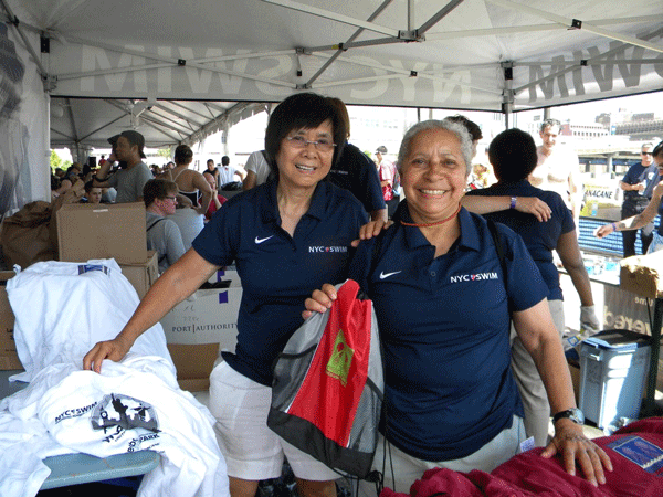 Looks like the swimmers’ ship came in: Volunteers handed out Brooklyn Bridge Swim swag after the race.