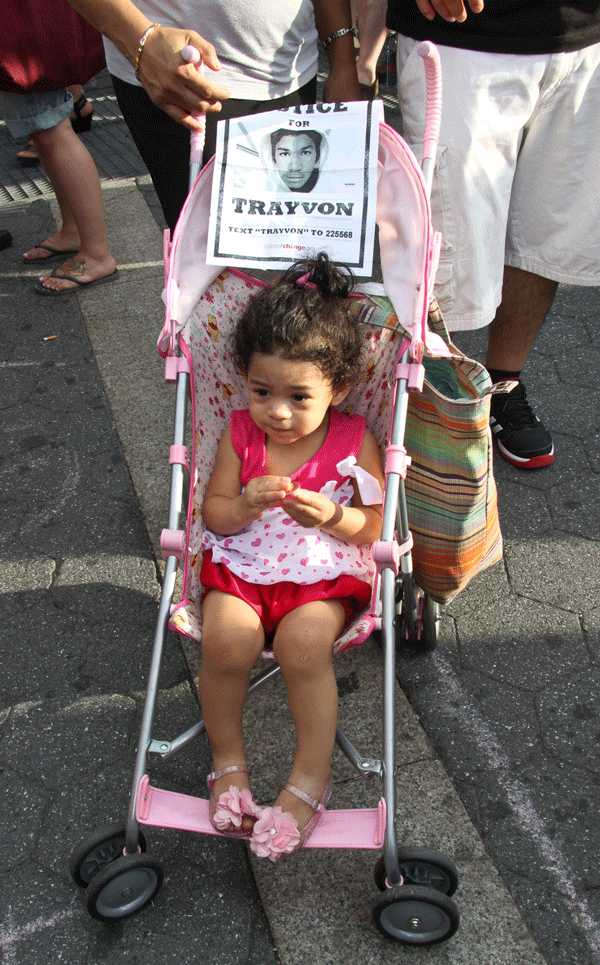 Photo by Tequila Minsky A young girl in Union Square on Sunday watched the protests against the Florida court’s acquittals of George Zimmerman.