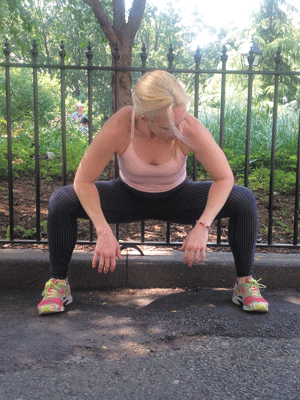 Ready to Run, in the Summer Sun 3 To stretch the groin muscle, stand with your feet hip width apart. Bend your knees and push your butt back as if you’re sitting in a chair a few inches behind you. Place your elbows on the insides of your knees and push out, to maximize the stretch.