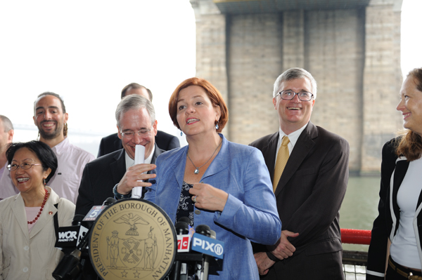 Is Brooklyn Bridge Beach the next 'stay-cation' location? 2 City Council Speaker Christine Quinn announcing money for a park at the Brooklyn Bridge beach. Downtown Express photo by Terese Loeb Kreuzer