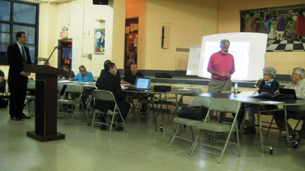 At CB4 Meeting, Housing at Fulton Takes The Lead 1 Photo by Eileen Stukane CB4 Land Use Committee co-chair Lee Compton (at right, standing), presided over discussion of the 158-unit, 18-story building planned for a Fulton Houses site currently occupied by a parking lot and a trash compactor.