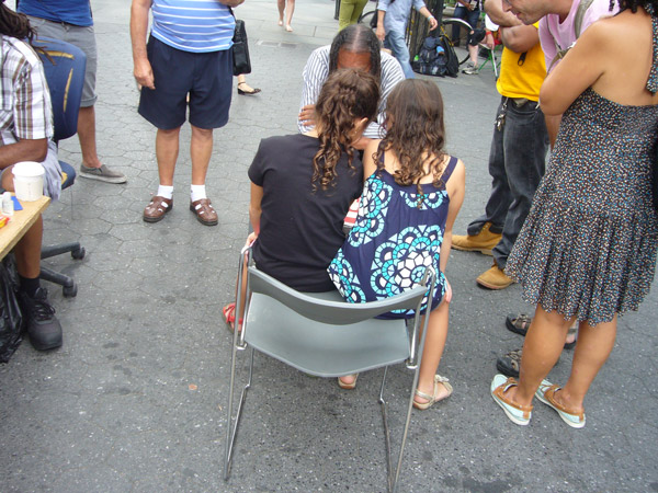  Two young girls teamed up to try to beat a chess sharp in Union Square.