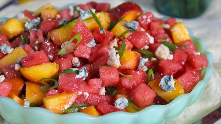 <b>WHAT YOU'LL NEED</b>:<br> 4 cups diced watermelon<br> 3 peaches, diced<br> 1/2 cup thinly sliced scallions<br> 2 teaspoons sherry vinegar<br> 4 ounces crumbled blue cheese (about 1 cup)<br><br> <b>HOW TO</b>:<br><br> Combine watermelon, peaches, scallions, vinegar and blue cheese in a large bowl. Allow to stand 10 minutes; taste and add salt, if desired. Makes 4 servings.