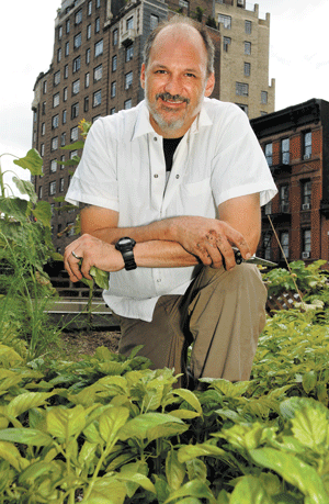 Photos by Bob Krasner Wade Moises enjoys getting away from the hectic kitchen of Rosemary’s and tending the restaurant’s rooftop garden.