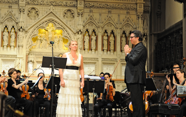 Trinity's 4-month marathon celebrating Britten, renowned composer & gay pioneer 2 Conductor Julian Wachner applauding mezzo-soprano Virginia Warnken for her performance of Benjamin Britten's "Phaedra" at Trinity Church on Sept. 5. Downtown Express photo by Terese Loeb Kreuzer.