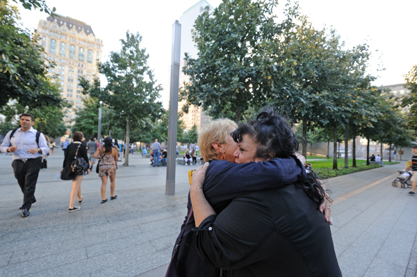 Hugs, tears and Laughs at 9/11 Memorial 1 Susan Cole, left, of Battery Park City, and Diane Lapson from Tribeca embraced at the (/11 Memorial Sunday night, Sept. 8 at the memorial's Community Evening. Downtown Express photo by Terese Loeb Kreuzer..