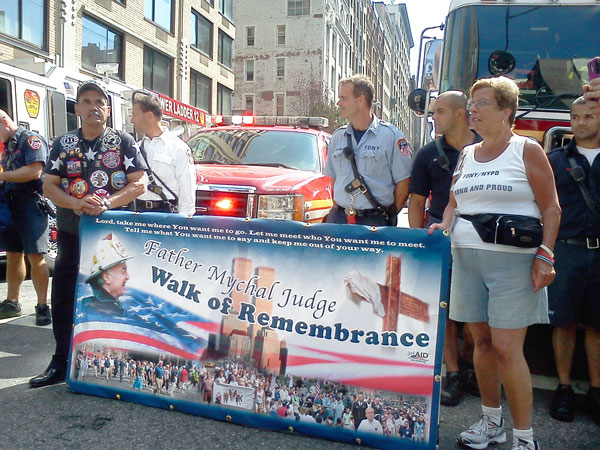Officers Honored, Responders Remembered at 10th Precinct Community Council Meeting 3 Photos by Scott Stiffler Members of Chelsea’s Engine 3, Ladder 12 & Battalion 7, joined by a contingent from the 10th Precinct, saluted the Father Mychal Judge Walk of Remembrance, which made a stop at Seventh Ave. & 19th St.