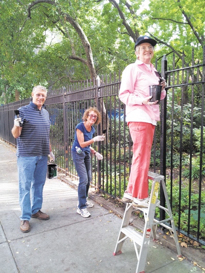 Park Fence Project Needs ‘Moore’ Help 2 Photo by Allen Oster L to R: Longtime 22nd St. residents Robert Edgar and Lynn Weinstein, along with W. 400 Block Assoc. president Mary Swartz, were among those who answered the call to spruce up Clement Clarke Moore Park’s fence.