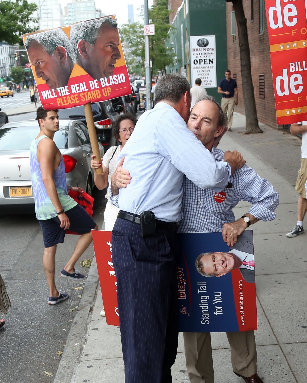 Mayoral candidate hugs lobbyist Jim Capalino at recent Stuyvesant Town rally for de Blasio.  Photo by Jefferson Siegel