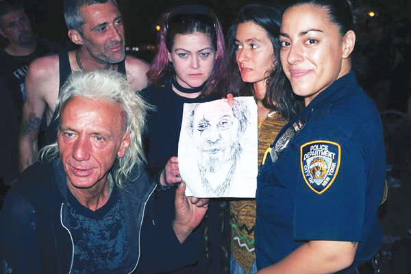 Friends howl for L.E.S. Jewels at Tompkins memorial 4 At the L.E.S. Jewels memorial, there was art, music and reading material, including a Bible, last week’s article on him in The Villager and cult writer Charles Bukowski’s novel “Women.”