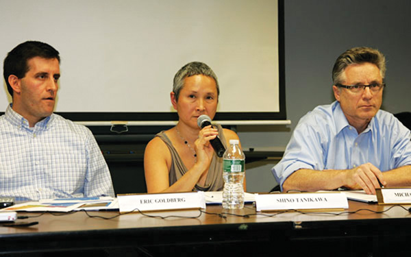 From left, District 2 Community Education Council members Eric Goldberg, Shino Tanikawa, the council’s president, and Michael Markowitz during a C.E.C. meeting last month about the school zone split.   Photo by Sam Spokony