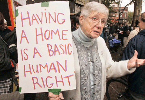 Sister Elizabeth Kelliher at a rally for housing.