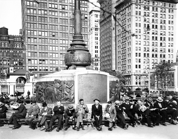 In October 1934, men — hopefully with jobs — relaxed on benches around Union Square’s Independence Flagpole.