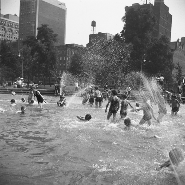 It was great to be a kid in Greenwich Village on July 7, 1935, because you could cool off in the Washington Square fountain, which doubled as a swimming pool. As the aerial photo below shows, buses were still driving through the park back then. After motor vehicles were finally kicked out of the park, it got a major redesign, with construction starting in 1969.   NYC PARKS DEPARTMENT