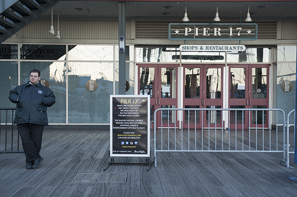 Standing guard outside Pier 17. Downtown Express photo by Terese Loeb Kreuzer.