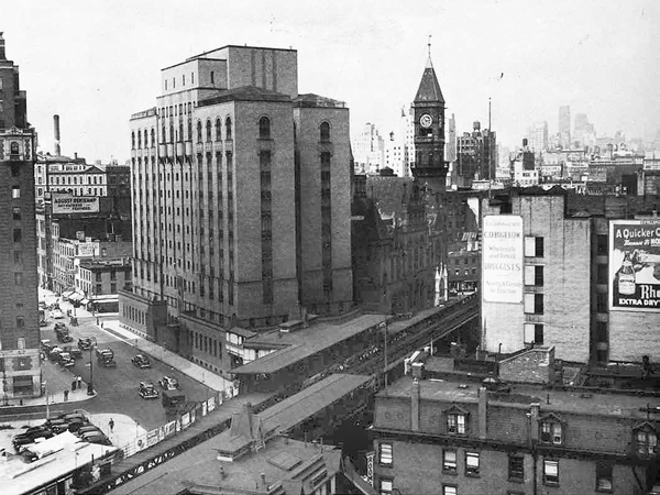 This photo from 1938 shows how the Women’s House of Detention once towered over the intersection of Greenwich and Sixth Aves., which also featured the Sixth Ave. El.