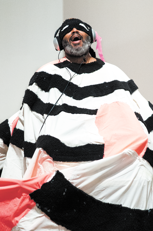 Trenton Doyle Hancock performing “Devotion” at the Contemporary Arts Museum Houston — to be performed at Grey Art Gallery on Nov. 7. PHOTO BY MAX FIELDS, COURTESY THE ARTIST AND CONTEMPORARY ARTS MUSEUM HOUSTON