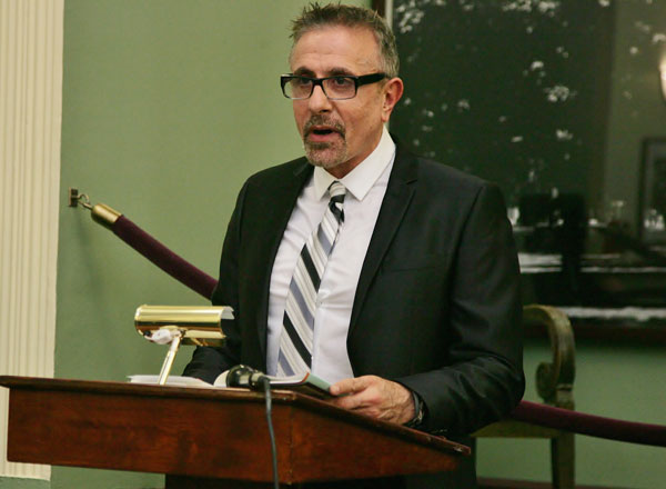 Photo by Sam Spokony Perry Halkitis read from his new book "The AIDS Generation: Stories of Survival and Resilience" during a release party at New York University on Oct. 10.