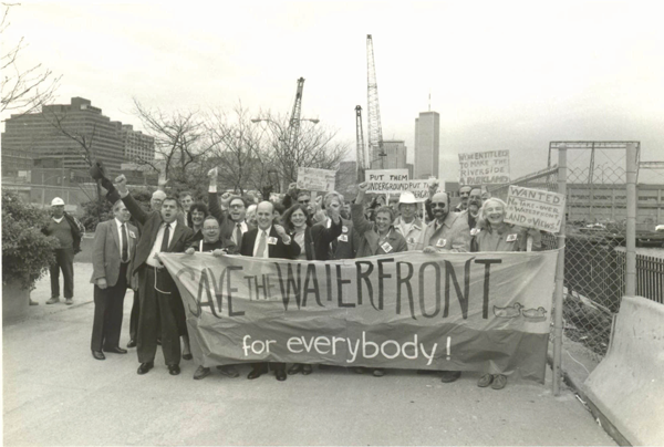 An editor’s notebook: Looking (and moving) east, AIDS, Off Broadway plays, awards and ‘going daily’ 2 Even after Westway’s defeat, Villagers still had plenty to protest about on the waterfront. In 1989, above, they rallied against a plan for PATH train ventilation towers on the waterfront south of Christopher St. From left, Bill Hine (back row, fourth from left), Larry Selman, Ben Green, representing Assemblymember Bill Passannante, Miriam Lee of the Village Homeowners’ Association, Comptroller Harrison J. Goldin, then a mayoral candidate, Bob Oliver (partially obscured by raised hand) of the Federation to Preserve the Greenwich Village Waterfront & Great Port, Judy Seigel of the Morton Street Block Association, Vern Fry and Artie Strickler. BROOKLYN COLLEGE LIBRARY ARCHIVES