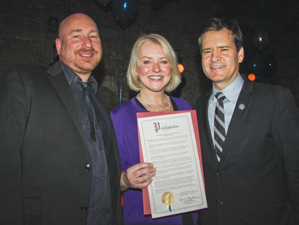 State Senator Brad Hoylman, right, presented a proclamation to Villager Editor in Chief Lincoln Anderson, left, and Publisher Jennifer Goodstein.