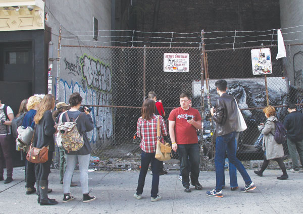 Banksy’s Allen St. piece has been drawing a crowd.