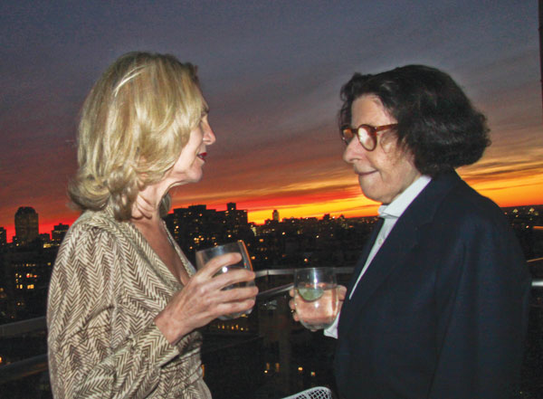 Photo by Tequila Minsky  The sunset was sublime from the top of The Standard, East Village, but Georgette Fleischer, left, was more intent on filling in Fran Lebowitz about efforts to relocate a Citi Bike station from Petrosino Square.