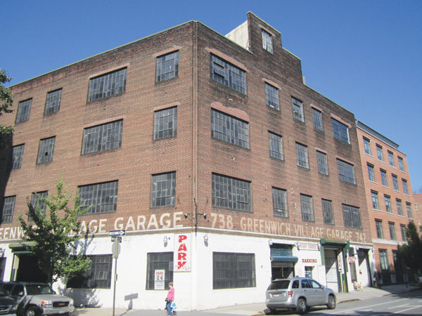 Photo by Lincoln Anderson The old, four-story garage building at 125 Perry St. is on the market for sale as conversion into luxury condos or even as a single-family mansion.