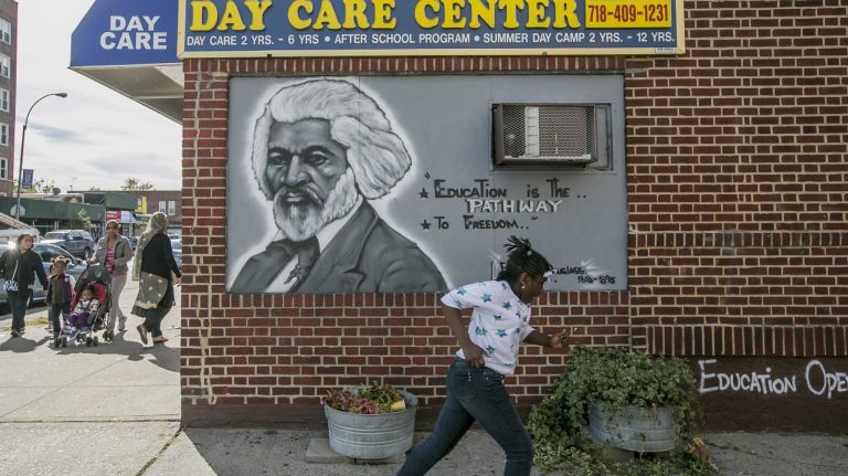 A mural of Frederick Douglass.