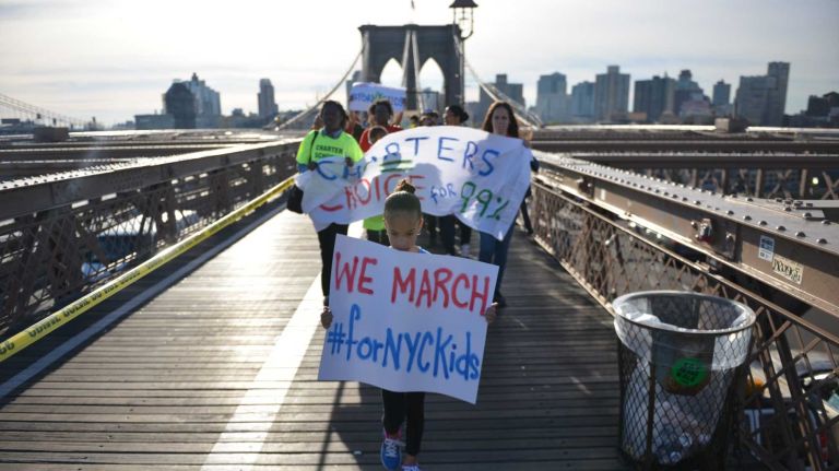 Teachers and parents met at Cadman Plaza in Brooklyn to hold a rally before marching across the Brooklyn Bridge and ending at City Hall. The rally is geared on supporting Charter Schools. (Oct. 8, 2013)