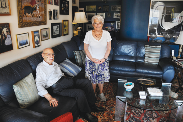 Natalie and Frank Rosenberg in their Greenwich Village apartment. They are willing to share their home generously on special occasions, such as the time they let about 100 guests attend a gay wedding in their living room.